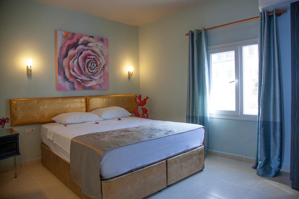 קס Sunset Villa Hotel חדר תמונה